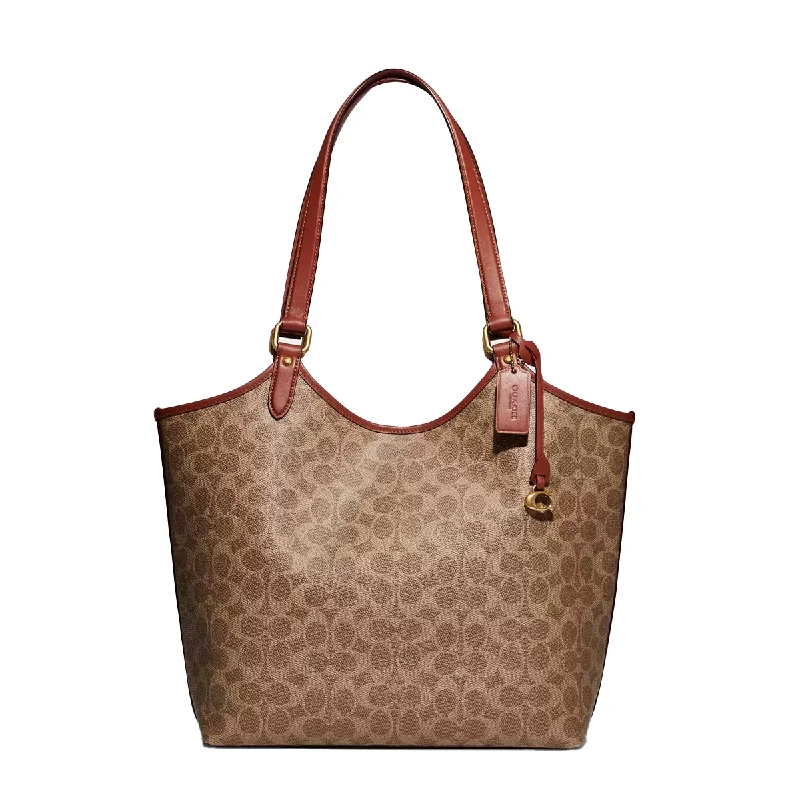 Ladies Coach Tabby bags with a detachable shoulder strapCoach Day Tote Bag In Signature Canvas