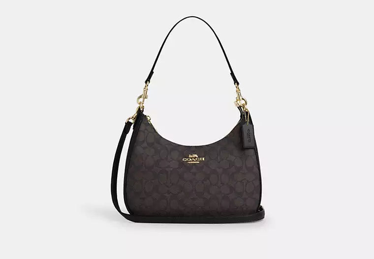 Coach bags with a zip - top closure and a front - pocket for quick accessCoach Teri Hobo in Signature Canvas