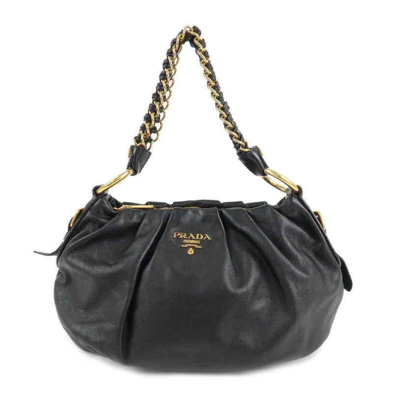 Prada handbags with a perforated leather detail for a unique and breathable designPRADA Leather Chain One-Shoulder Bag Black Gold Hardware