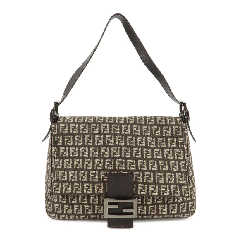 Ladies Fendi Peekaboo bags with a detachable shoulder strap for different carrying optionsFENDI Mamma Bucket Zucchino Canvas Leather Shoulder Bag 8BR001