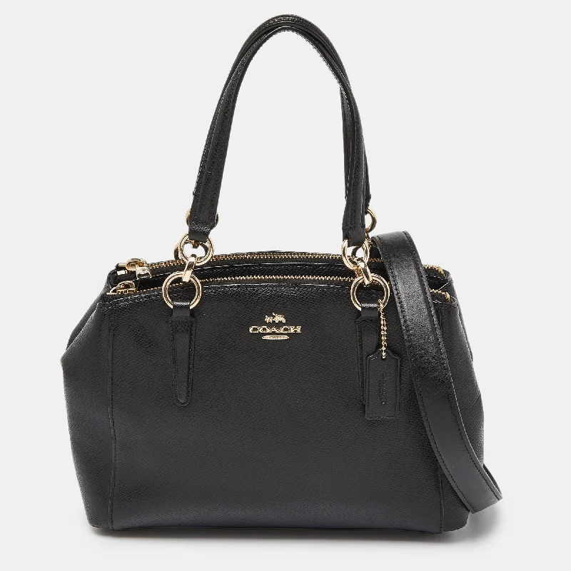 Coach tote bags with a spacious interior and multiple compartments for organizationBlack Leather Minetta Satchel