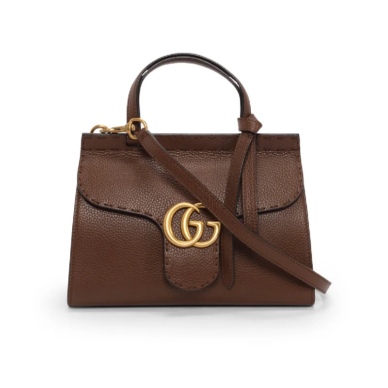 Women Gucci Sylvie bags with a crystal - embellished web stripeGucci Brown Calfskin Mini GG Marmont Top Handle Bag