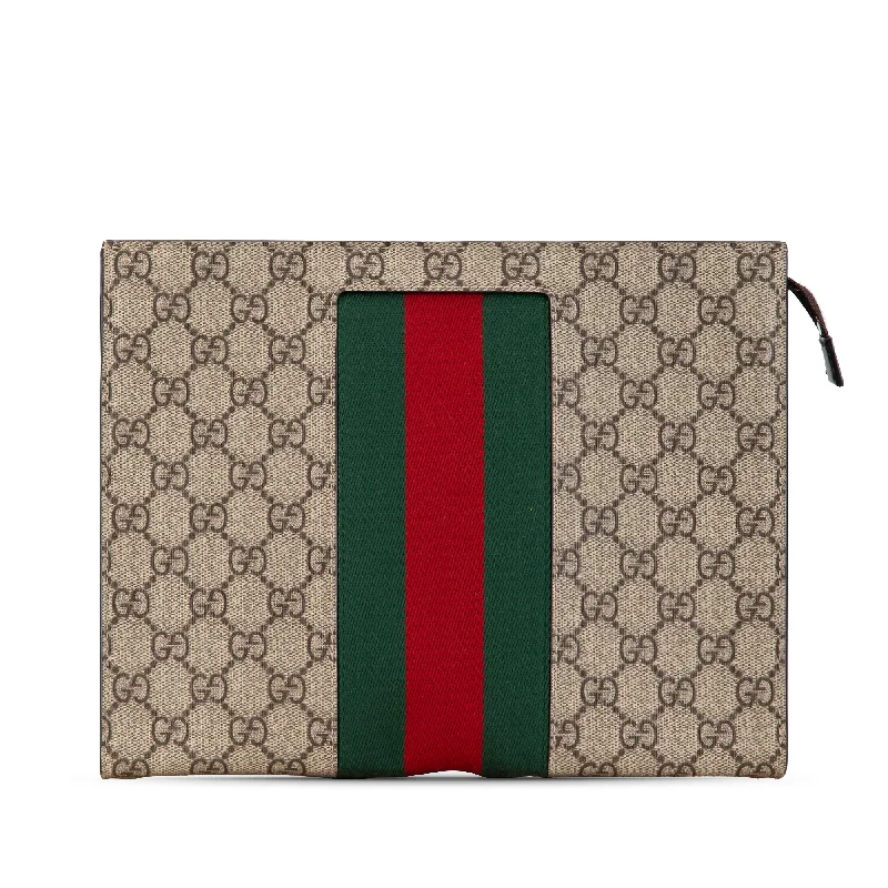 Gucci Marmont bags for women with a contrast - colored interiorBrown Gucci GG Supreme Web Clutch