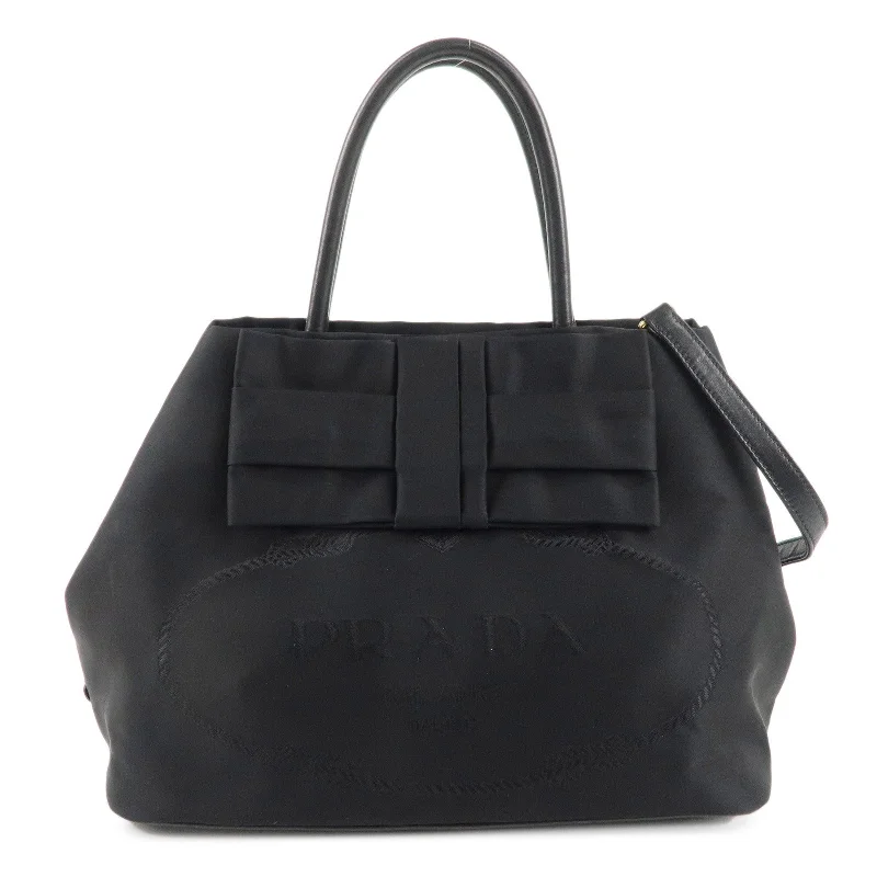 Prada handbags with a patent - leather finish for a shiny and sophisticated appearancePRADA Nylon Leather Ribbon Logo 2Way Bag Hand Bag Black 1BG068