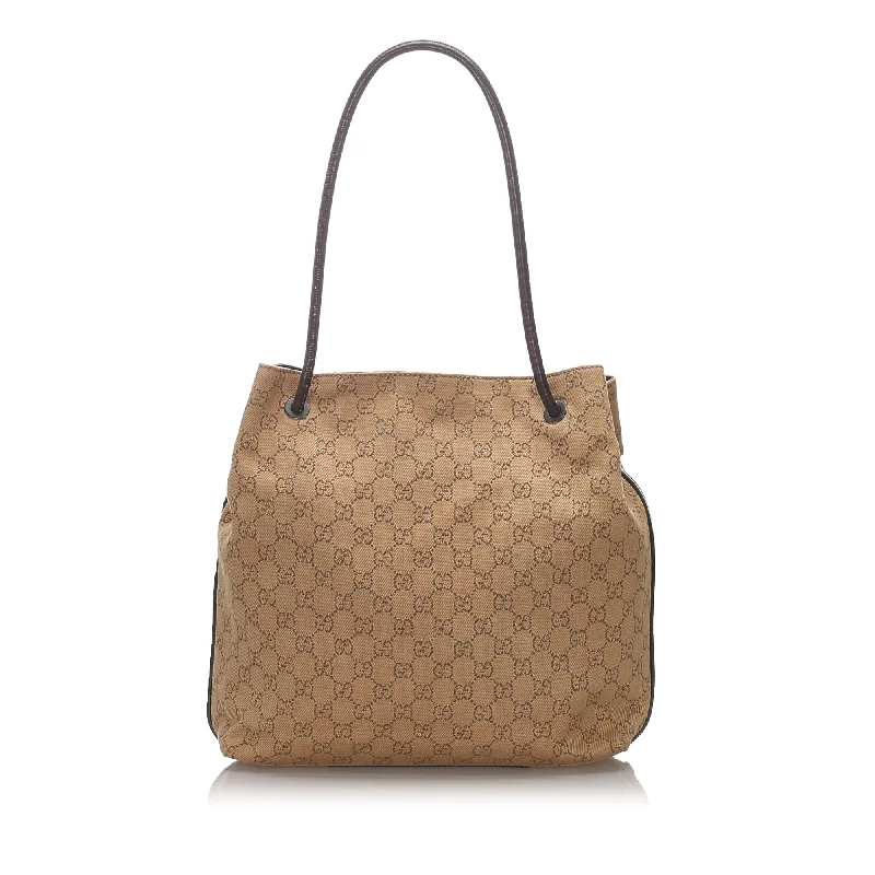 Women Gucci bags with a magnetic snap closure for easy accessGucci Brown Light Canvas Fabric GG Gifford Tote Bag Italy