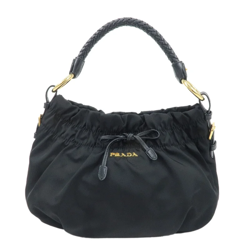 Ladies Prada Galleria bags with gold - toned hardware for a luxurious touchPRADA Nylon Leather Shoulder Bag Black