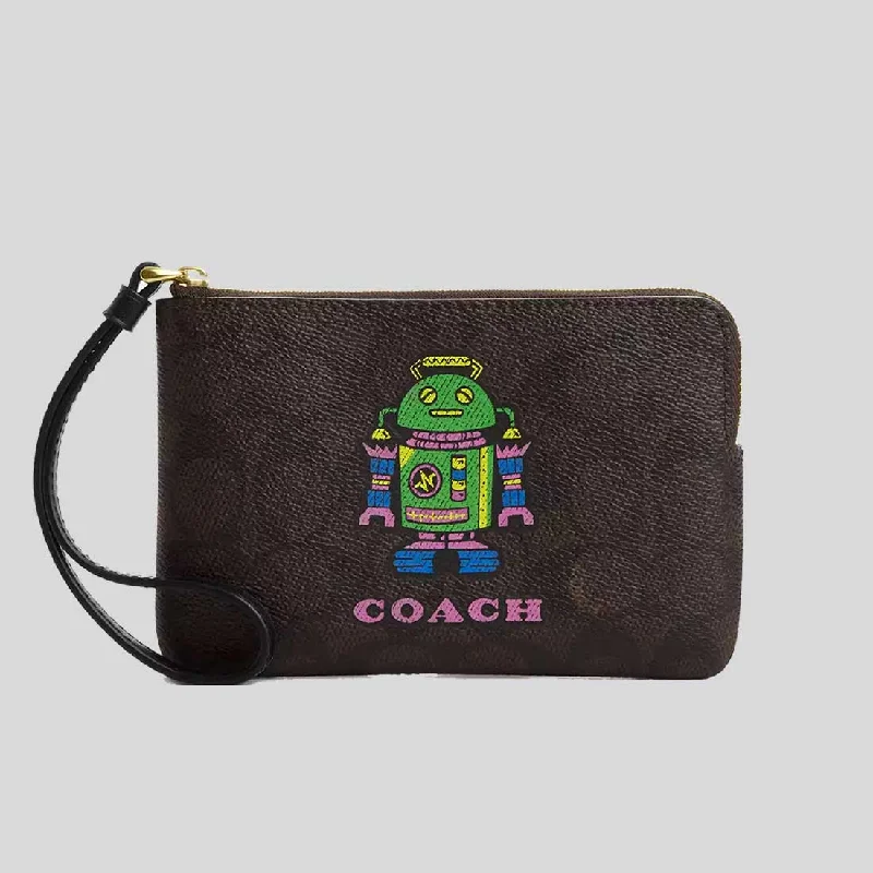 Coach bags with a front - zip pocket for small items like keys and cardsCOACH Corner Zip Wristlet In Signature Canvas With Robot Print CW868