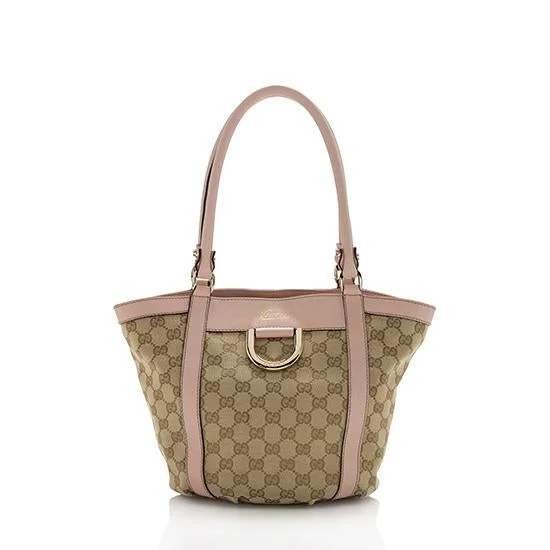 Ladies Gucci shoulder bags with a tassel decorationGucci GG Canvas D-Ring Tote