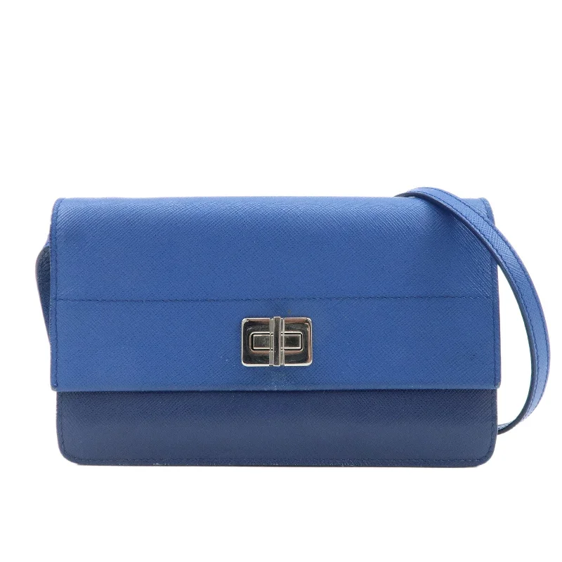 Prada bags with a zippered interior pocket for separating itemsPRADA Leather Shoulder Bag Blue Navy