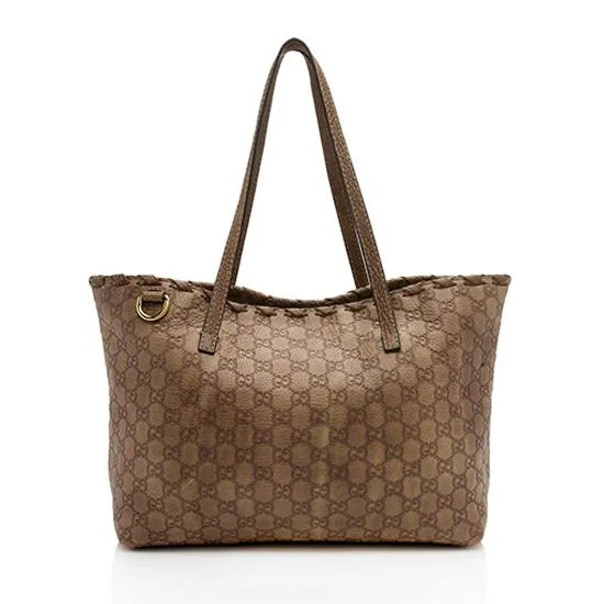 Gucci tote bags for women with a spacious interiorGucci Guccissima Leather Bamboo Tassel Tote - FINAL SALE