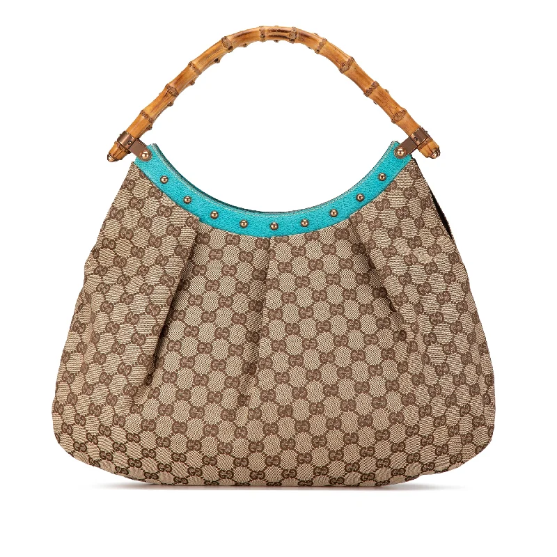 Gucci Marmont bags for women with a contrast - colored interiorBrown Gucci GG Canvas Bamboo Studded Hobo