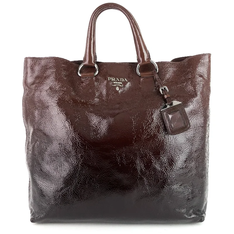 Prada bags with a snap - button closure and a decorative charm for a fashionable lookNaplak Leather Shopper Tote Bag