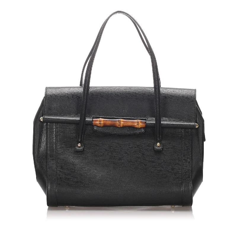 Women Gucci bags with interlocking G hardware for a classic lookGucci Black Calf Leather Bamboo Bullet Tote Bag Italy