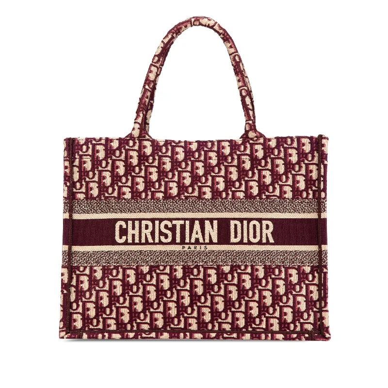 Christian Dior backpacks with a sleek, minimalist silhouetteRed Dior Medium Oblique Book Tote