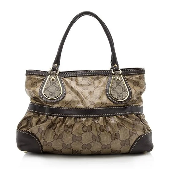 Women Gucci Sylvie bags with a monogram - embossed leatherGucci GG Crystal Supreme Mix Tote