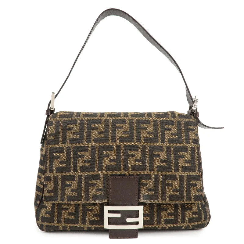 Fendi tote bags with a printed Fendi logo on the front for high brand visibilityFENDI Mamma Baguette Zucca Canvas Leather Shoulder Bag 26325