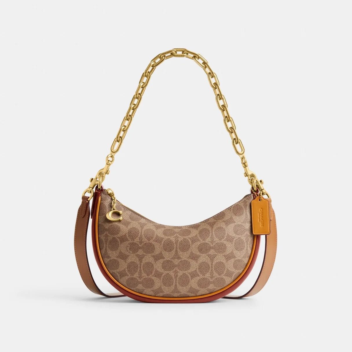 Coach Rogue bags with a monogram - embossed leather surfaceCoach Mira Shoulder Bag In Signature Canvas