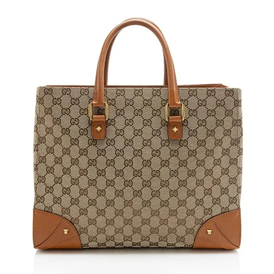 Ladies Gucci Dionysus bags in a pastel colorGucci GG Canvas Nailhead Large Tote