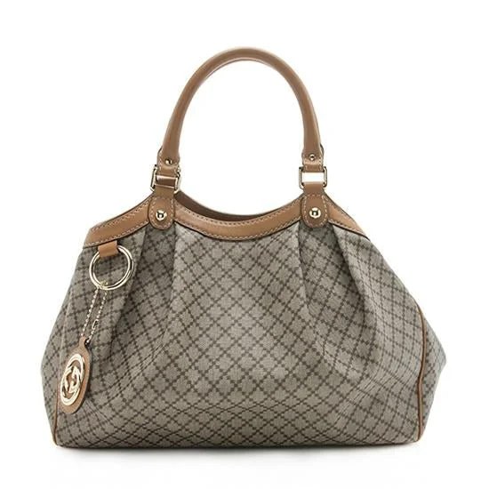 Ladies Gucci Dionysus bags with a star - shaped charmGucci Diamante Canvas Sukey Medium Tote