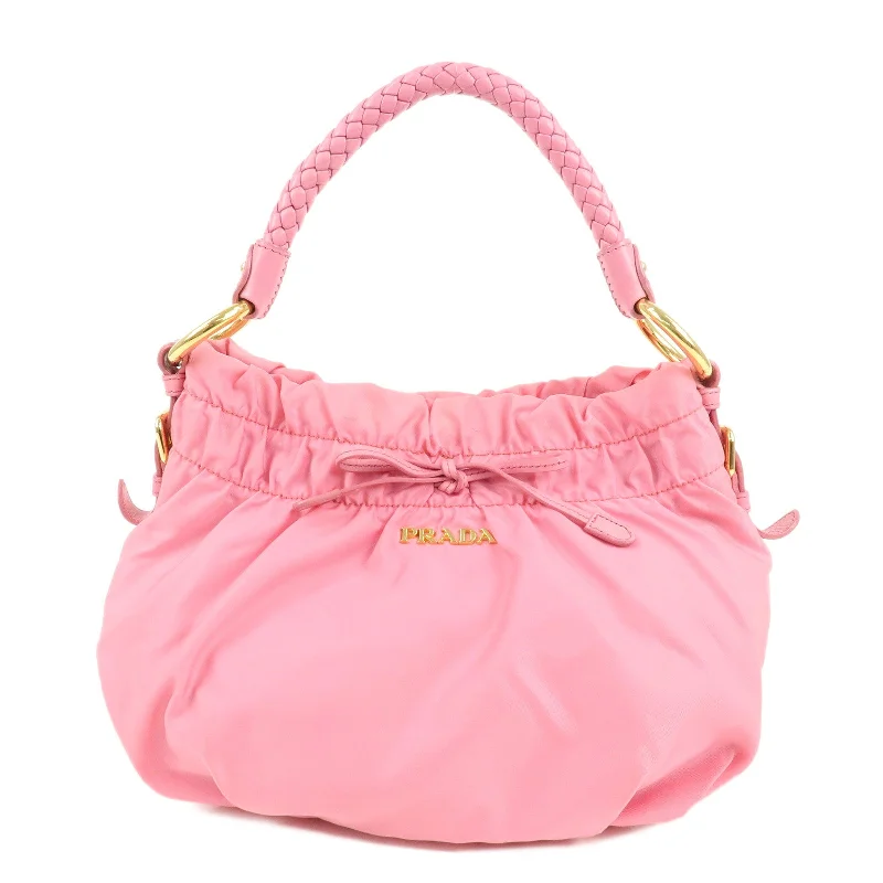 Prada Cleo bags with a snakeskin - effect panel for a bold and trendy lookPRADA Nylon Leather Gather Shoulder Bag Hand Bag Pink BR4237