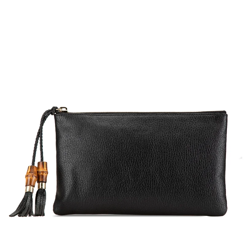 Ladies Gucci Dionysus bags with a star - shaped charmBlack Gucci Calfskin Bamboo Clutch