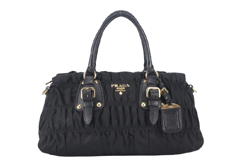 Prada bags with a zippered interior pocket for separating itemsPRADA GAUFRE 2WAY BAG BLACK NYLON GOLD HARDWARE WITH STRAPS NO DUST COVER