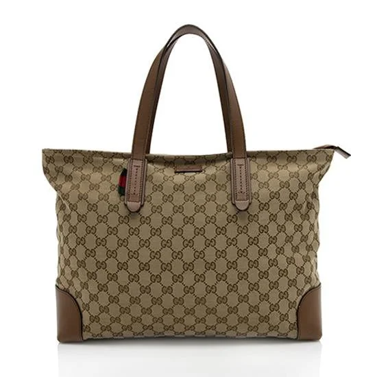 Women Gucci Sylvie bags featuring the signature web stripeGucci GG Canvas Original Large Tote