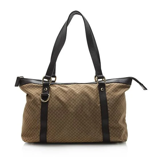 Women Gucci crossbody bags with a woven leather strapGucci GG Nylon Abbey Tote