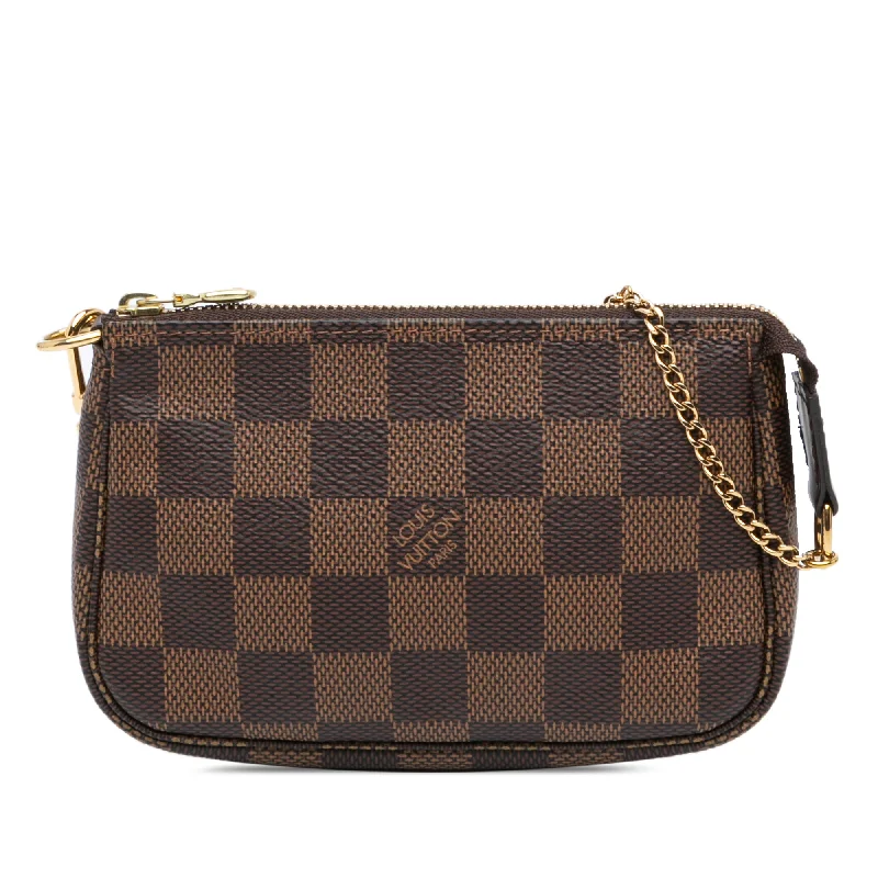 Ladies Louis Vuitton handbags with a detachable coin purse insideBrown Louis Vuitton Damier Ebene Mini Pochette Accessoires Handbag