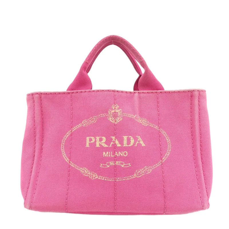 Prada handbags with a perforated leather detail for a unique and breathable designPRADA Logo Canapa Mini Canvas Hand Bag Tote Bag Pink 1BG439