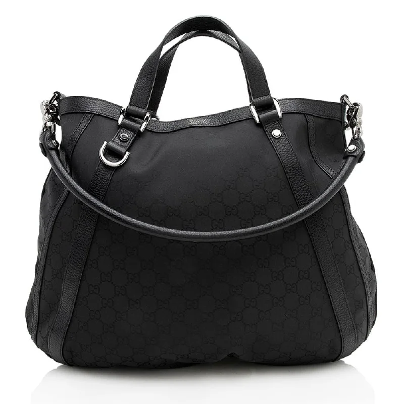 Ladies Gucci Dionysus bags with a star - shaped charmGucci GG Nylon Abbey Convertible Tote