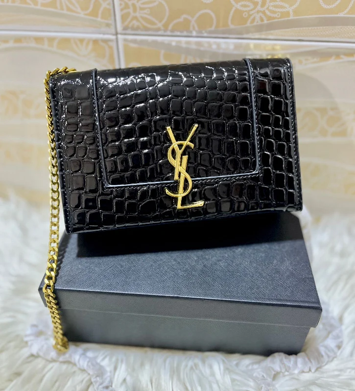 Yves Saint Laurent bags with luxurious suede detailsSaint Laurent Kate Small YSL Crossbody Bag (Black 1)