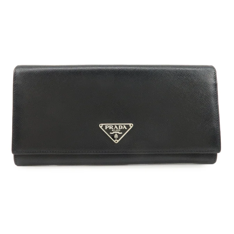 Prada bags with a snap - button closure and a decorative charm for a fashionable lookPRADA Leather Bi-fold Long Wallet Black Silver Hardware