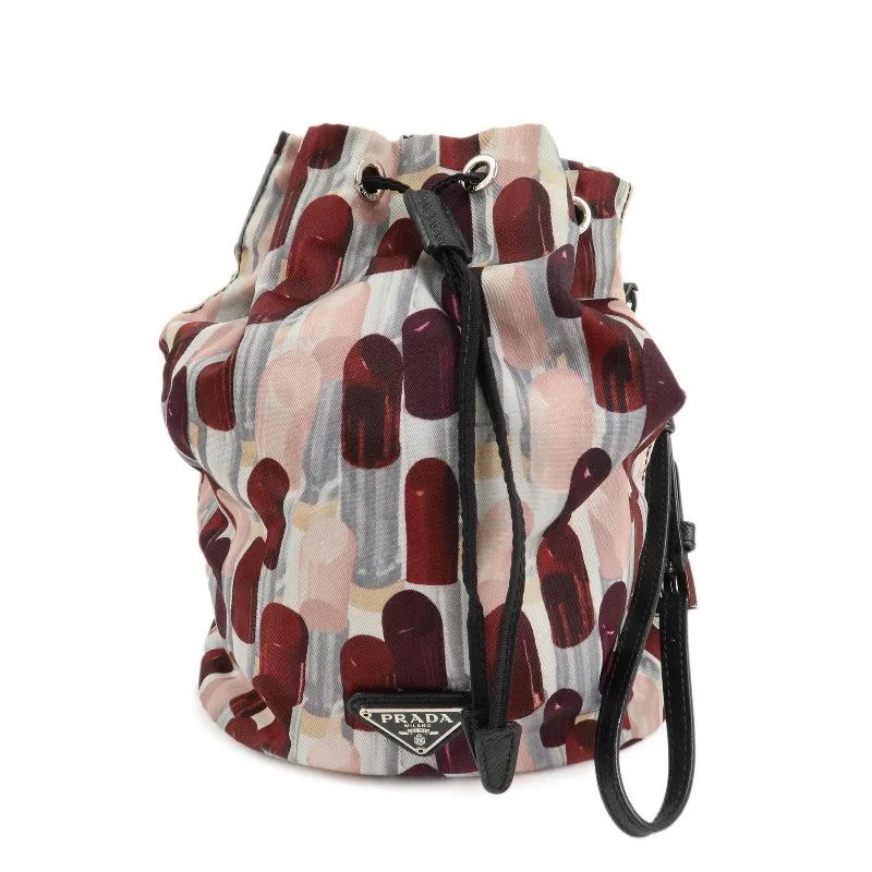 Prada Cleo bags with a curved shape and a chain - link shoulder strapAuthPRADA Logo Nylon Drawstring Pouch Lip Stick Print White Pink Red