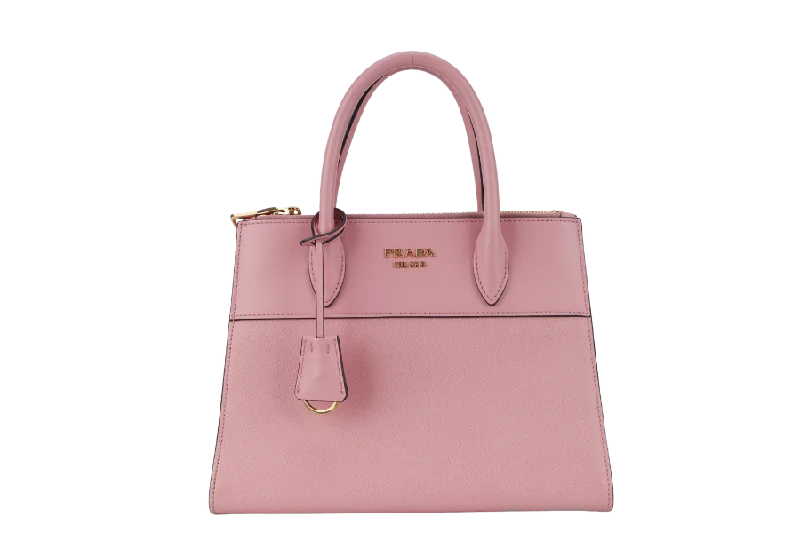 Prada tote bags with a double - handle and shoulder - strap option for easy usePRADA PARADIGME BAG (1BA103) PINK SAFFIANO LEATHER GOLD HARDWARE WITH STRAP AND DUST COVER