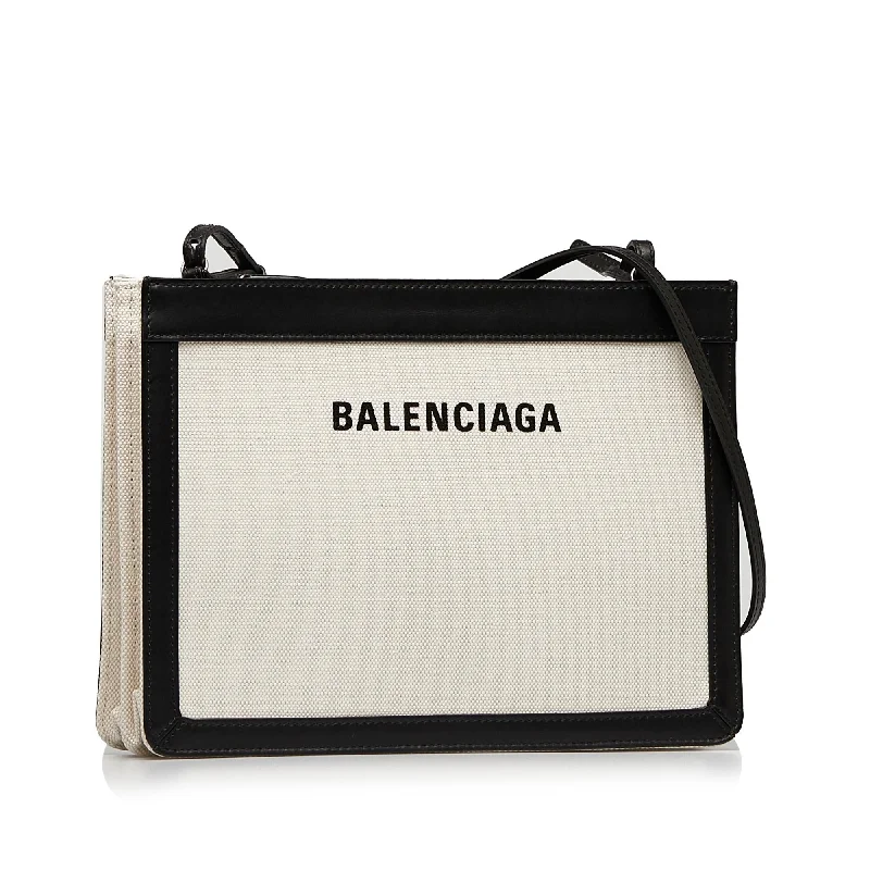 Balenciaga Hourglass small size with laser - cut detailsBalenciaga Hourglass small size with laser - cut detailsBalenciaga Navy Pochette M Crossbody (SHG-vvllwg)