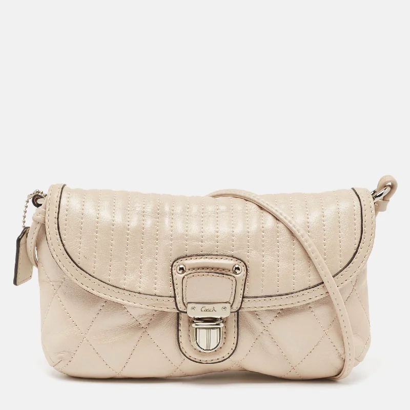 Coach bags with a zippered interior pocket for separating itemsBeige Quilted Leather Push Lock Crossbody Bag