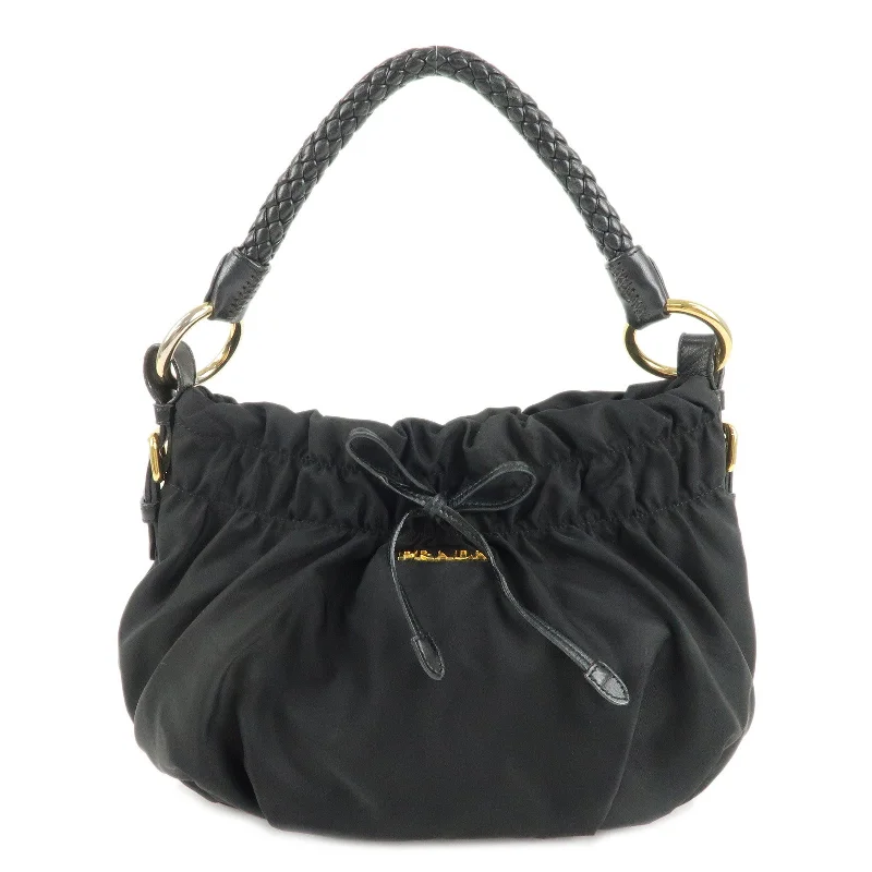 Prada Cahier bags with a detachable shoulder strap for versatile carryingPRADA Nylon Leather Gathered One Shoulder Bag Black Gold HDW