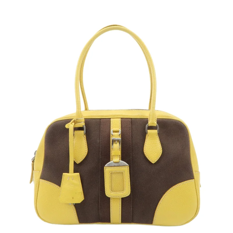 Prada Cleo bags with a snakeskin - effect panel for a bold and trendy lookPRADA Canvas Leather Shoulder Bag Hand Bag Brown Yellow