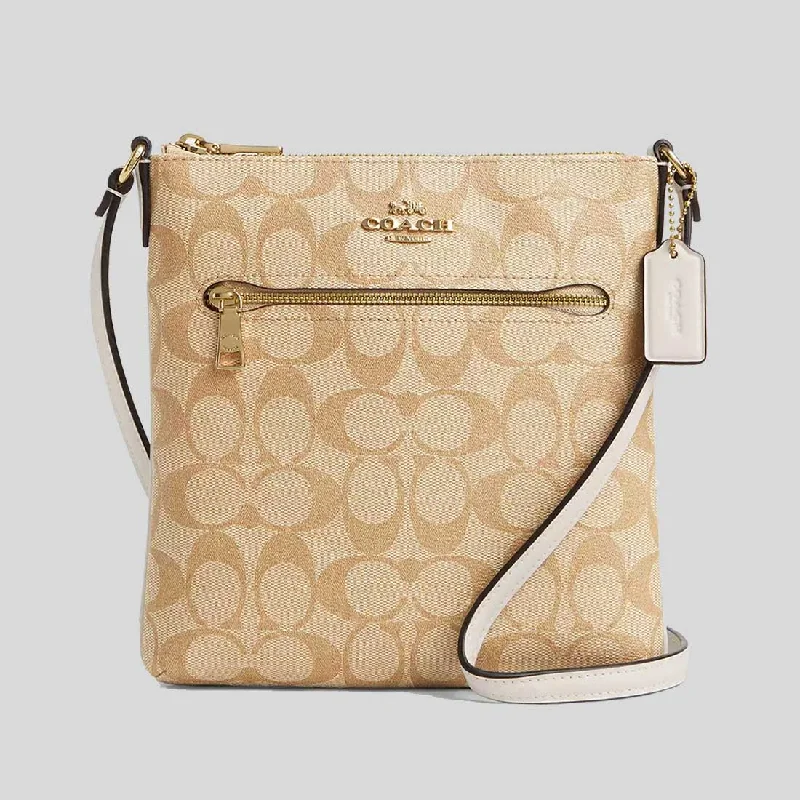 Ladies Coach Borough bags in a pastel shade for a soft and delicate appearanceCOACH Mini Rowan File Bag In Signature Canvas Light Khaki/Chalk CS182