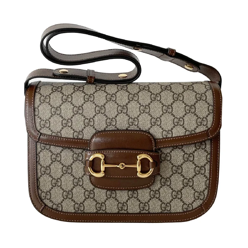 Women Gucci bags with a snap - button closure and a decorative charmGucci GG Horsebit 1955 Shoulder Bag