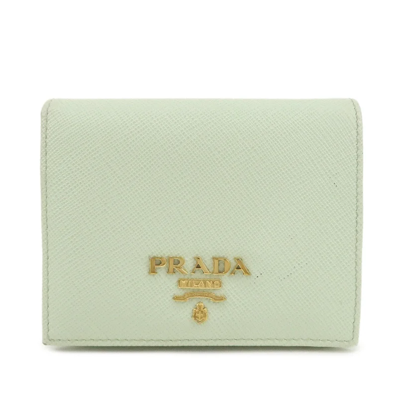 Prada bags with a front - zip pocket for small items like cards and keysPRADA Logo Saffiano Leather Bi-Fold Small Wallet Light Green