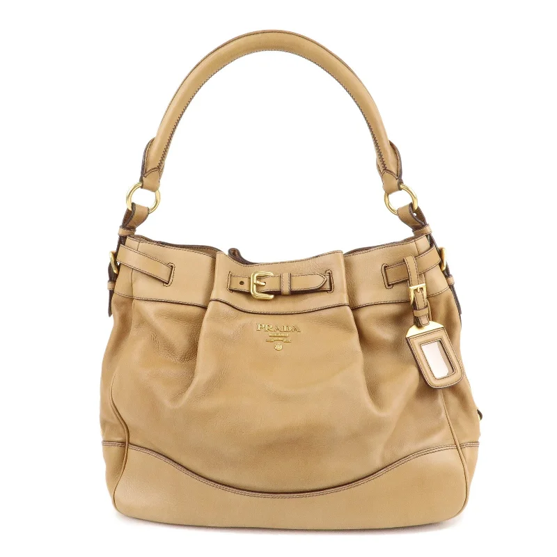 Prada bags with a zip - top closure and multiple interior pockets for organizationPRADA Leather One Shoulder Bag Brown