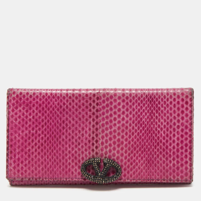 Valentino bags with bold and unique texturesFuchsia Snake Leather Crystal Catch Flap Wallet