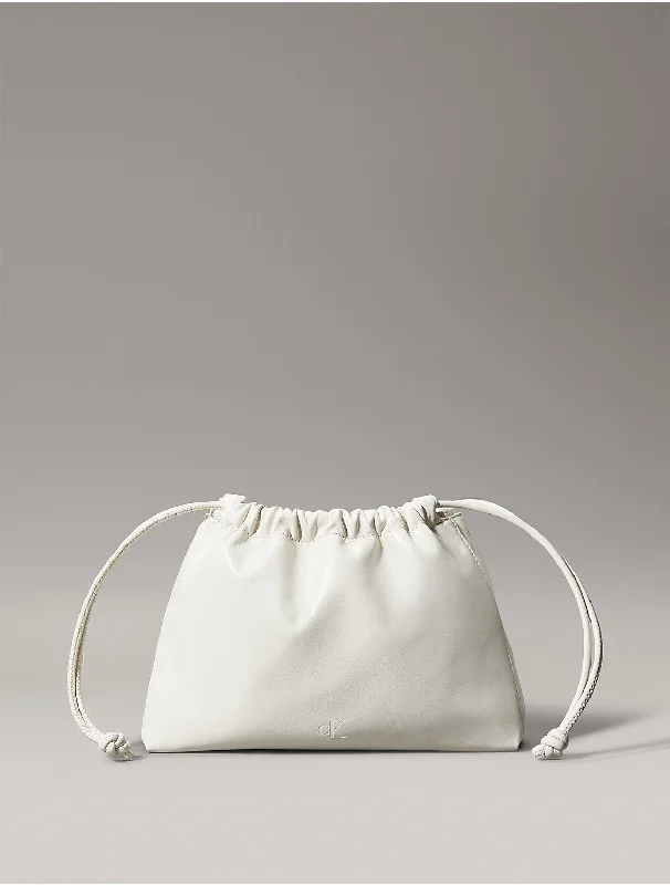 Calvin Klein women’s handbags on saleWomen's Drawstring Crossbody Bag - White