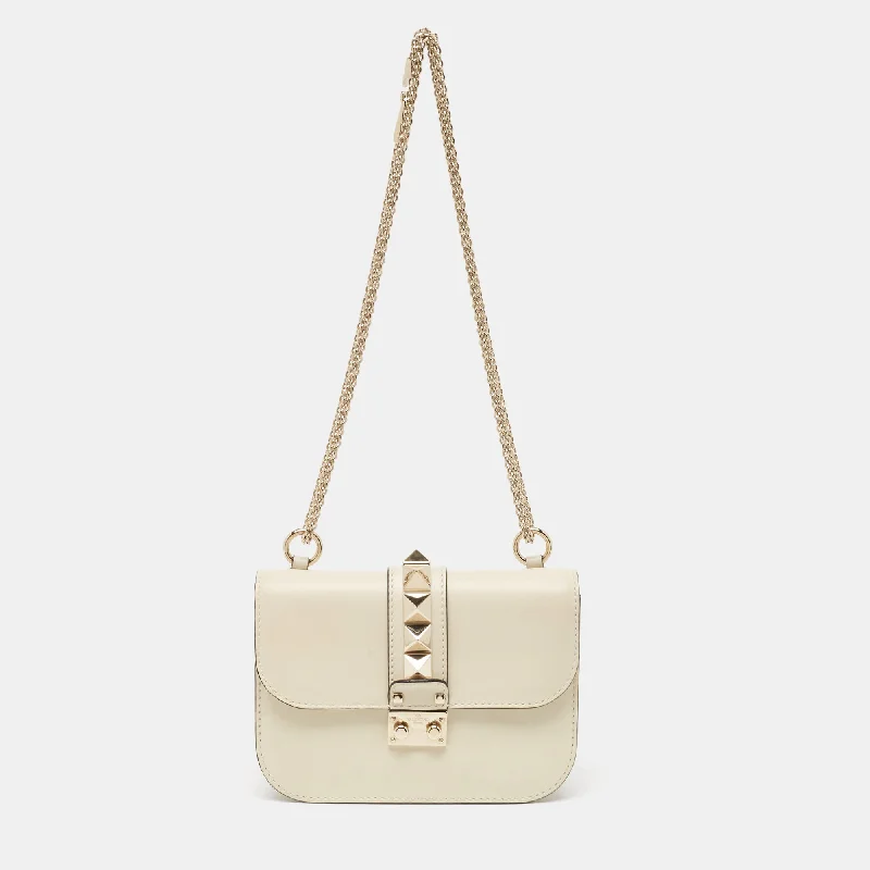 Valentino bags for street style fashionOff White Leather Small Rockstud Glam Lock Flap Bag