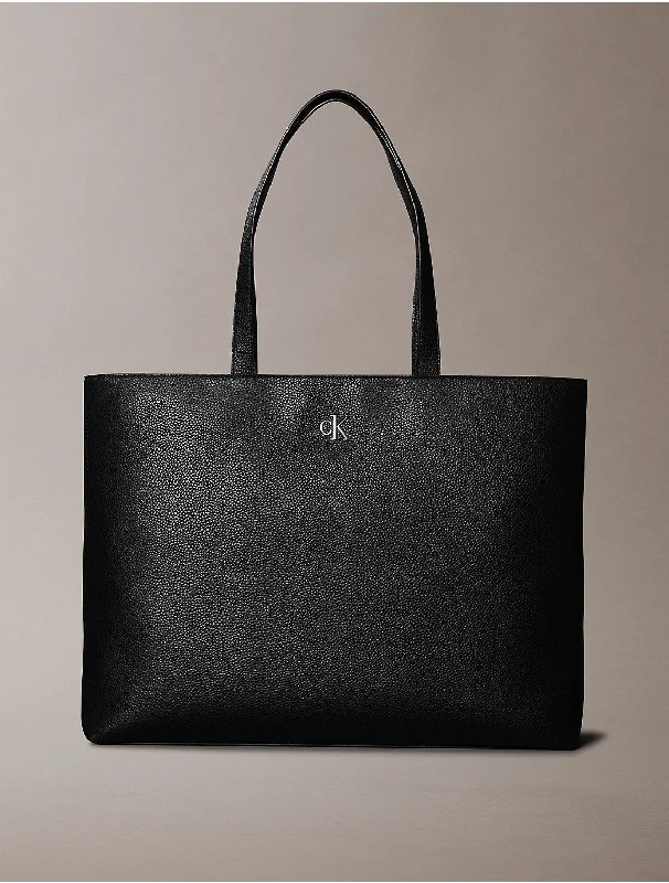 Calvin Klein bags with embossed logo designsWomen's Archive Hardware Tote Bag - Black