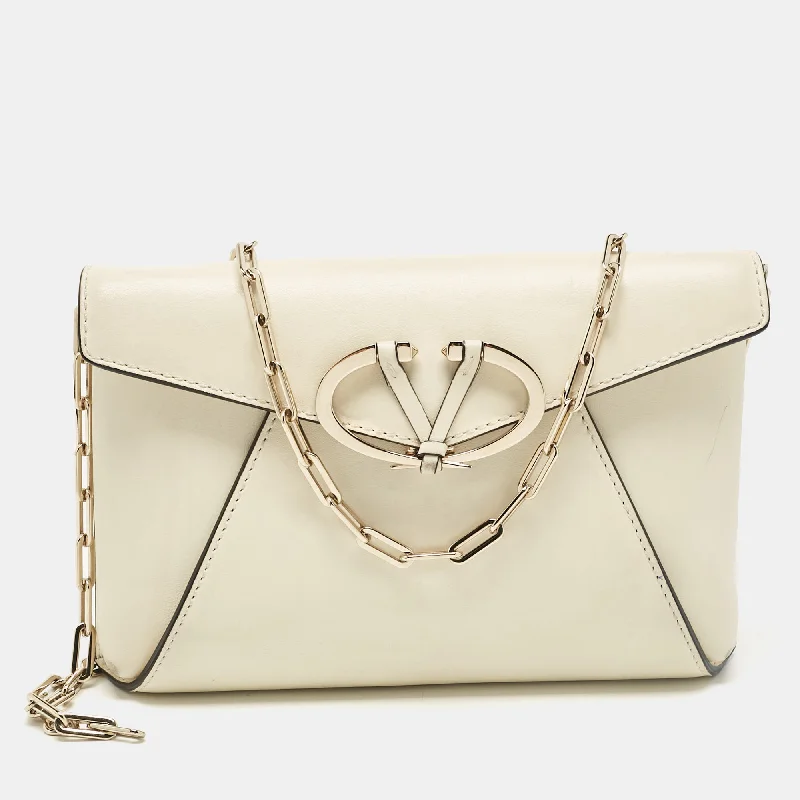 Valentino leather bags for sophisticated looksOff White Leather V Rivet Clutch Bag