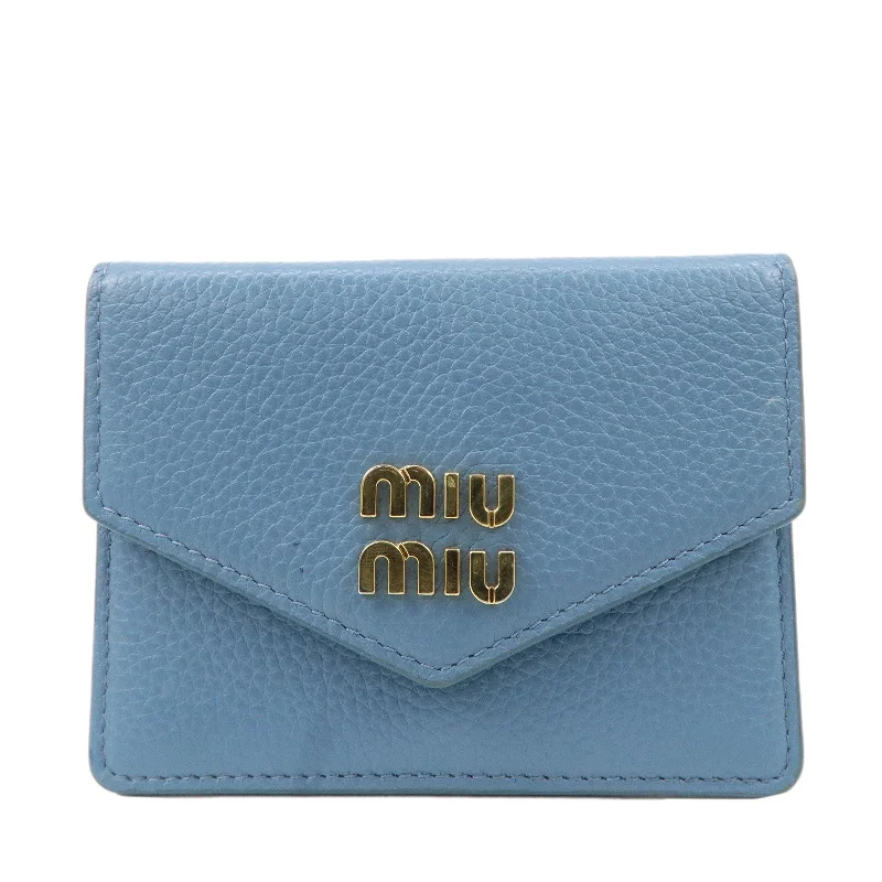 MIU MIU bags with unique hardware detailsMIU MIU Vitello Dino Leather Card Case Light Blue 5MF031