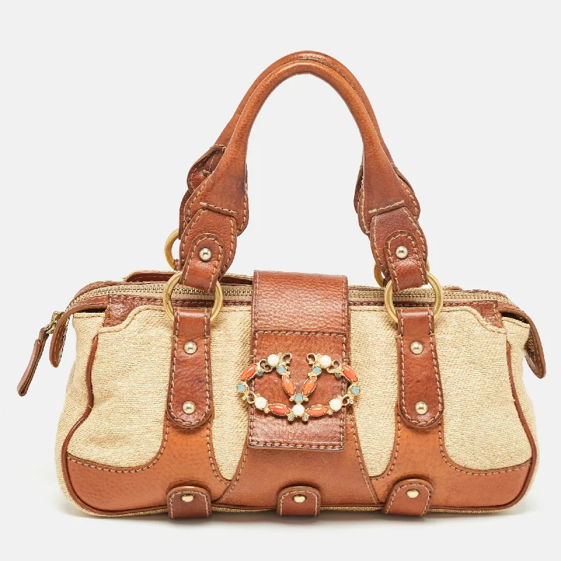 Valentino bags with vintage-inspired designsBrown/Beige Canvas and Leather VLogo Embellished Catch Bag